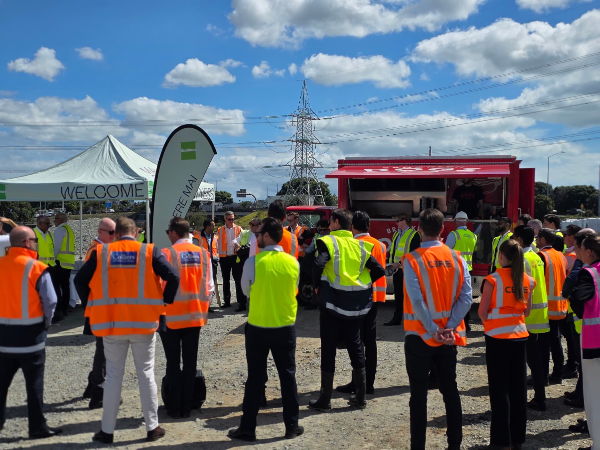The Brooklyn Dogs truck serving a corporate site crowd in hi-vis