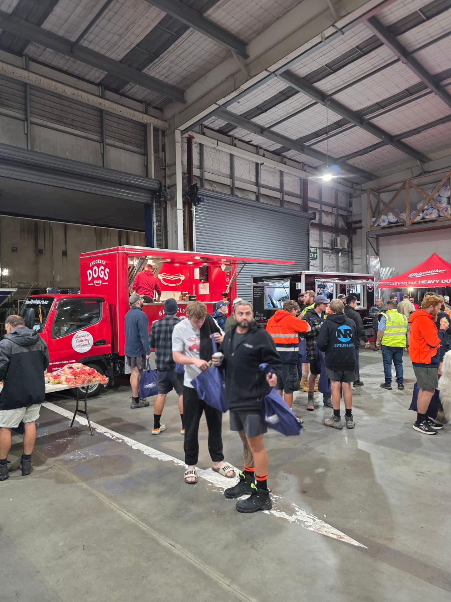 The Brooklyn Dogs truck at an indoor warehouse event